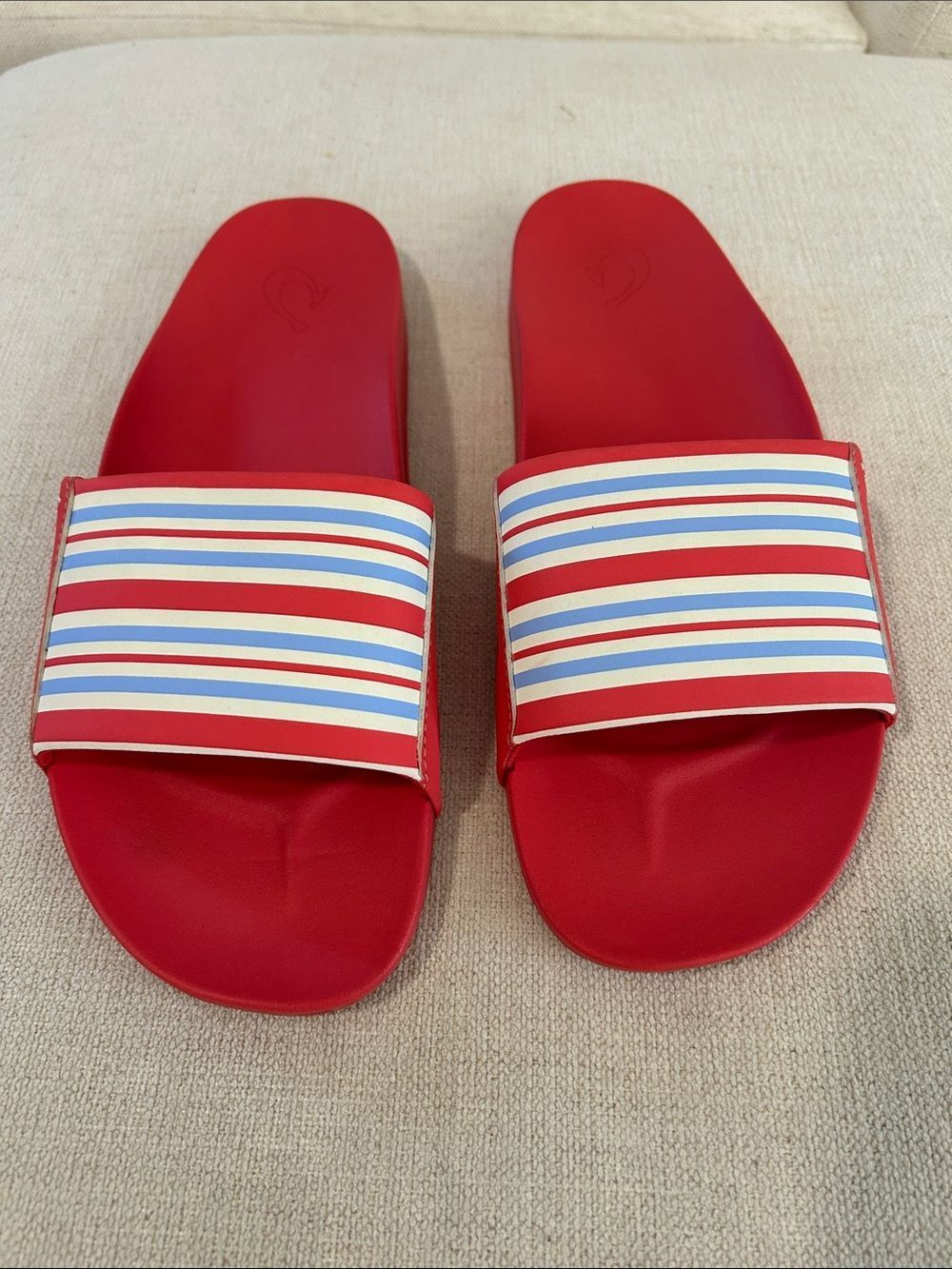 Olukai women's red slide sandals with vibrant striped straps, W11, NWOT